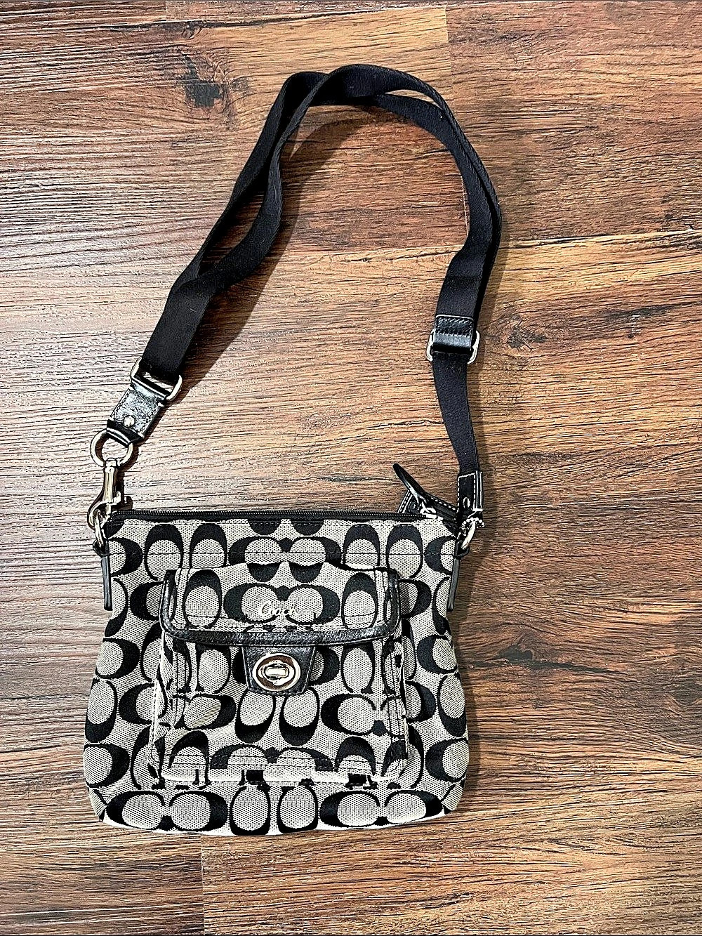 Coach Penelope Signature Turnlock Swingpack Black & White Crossbody Bag